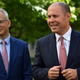 Australian Treasurer Josh Frydenberg (right) and the Minister for Communications Paul Fletcher in the Senate Courtyard at Parliament House on February 23, 2021 in Canberra, Australia.